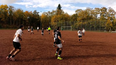 Spielszene auf Ascheplatz