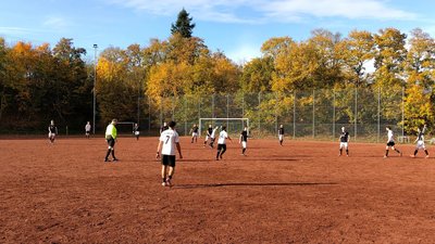 Spielszene auf Ascheplatz